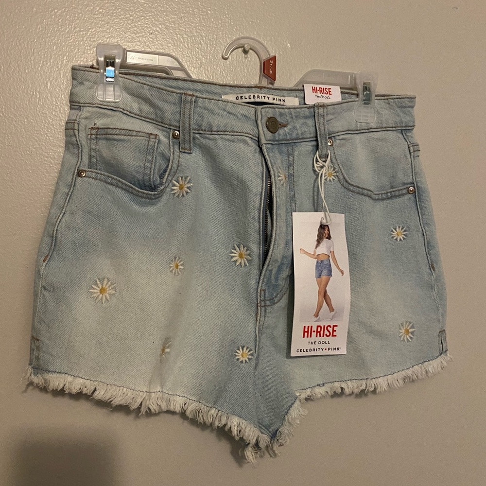 Celebrity pink daisy jeans shorts